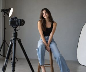 how to pose someone standing against a wall